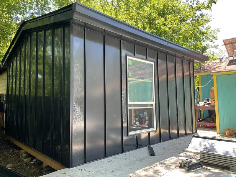 Black standing seam metal wall panels for Roof Inspection in Falmouth